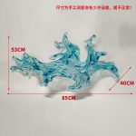 Transparent waves hanging in the air in the hotel lobby, artistic decorative resin ornaments hanging from the ceiling of the sales office in the shopping mall