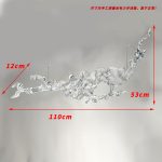 Transparent waves hanging in the air in the hotel lobby, artistic decorative resin ornaments hanging from the ceiling of the sales office in the shopping mall