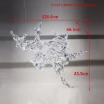 Transparent waves hanging in the air in the hotel lobby, artistic decorative resin ornaments hanging from the ceiling of the sales office in the shopping mall