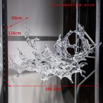 Transparent waves hanging in the air in the hotel lobby, artistic decorative resin ornaments hanging from the ceiling of the sales office in the shopping mall