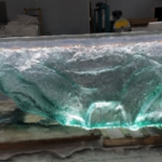 Transparent resin luminous crystal island, light luxury home dining table, ice cubes, stones, high-end feeling, hotel reception bar, front desk