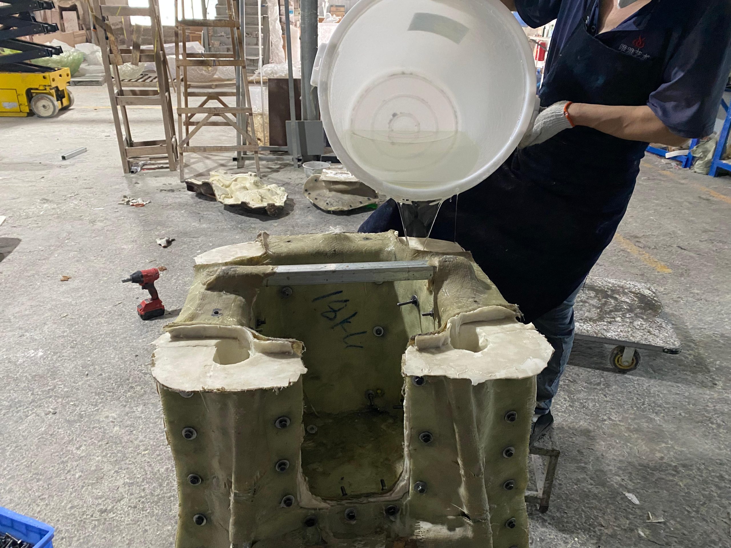 POUR IN RAW MATERIALS